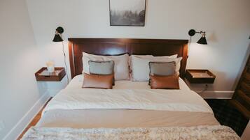 1 bedroom, desk, iron/ironing board, travel crib