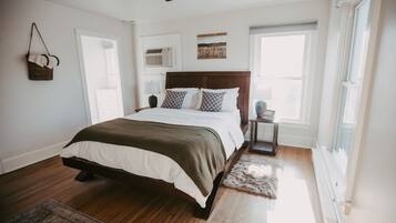 1 bedroom, desk, iron/ironing board, travel crib