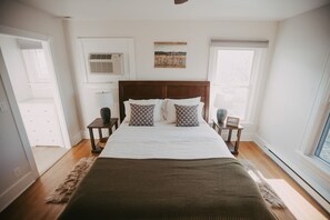 1 bedroom, desk, iron/ironing board, travel crib