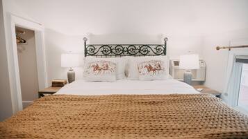 1 bedroom, desk, iron/ironing board, travel crib