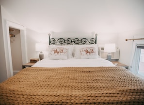 1 bedroom, desk, iron/ironing board, travel crib