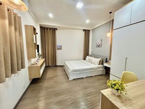 Deluxe Room, City View | Premium bedding, down duvets, memory-foam beds, individually furnished - Convinia home Truong Quyen (Ho Chi Minh City)