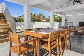 Outdoor dining - Grace by The Sea · 2025 Build · Steps to Beach (Fort Myers Beach)