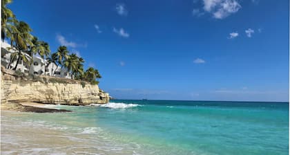 Beachfront condo at beautiful Cupecoy Beach Club. 2 bedroom, 3 bath, amenities!