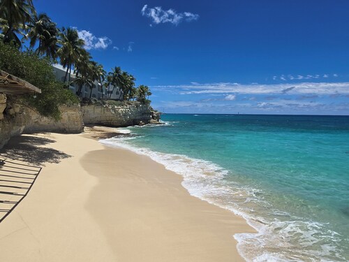 Beachfront condo at beautiful Cupecoy Beach Club.  2 bedroom, 3 bath, amenities!