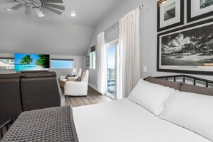 1 habitación y tabla de planchar con plancha 