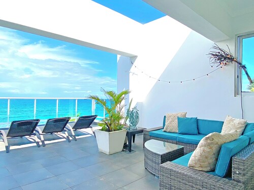 Spacious 4-bedroom condo with WiFi and AC in serene BlueGreen Oceanfront Condos