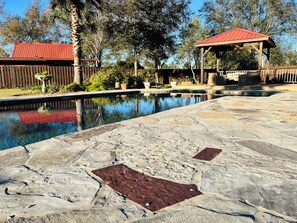 Outdoor pool - Cozy farmhouse right outside the city. Perfect for a getaway with big groups. (Lake Charles)