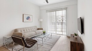 Apartment, 1 Bedroom | Living area | 40-inch TV with digital channels - Landing Apartments Denton (Denton)