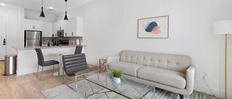 Apartment, 1 Bedroom | Living area | 40-inch TV with digital channels