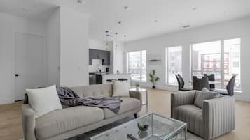 Apartment, 2 Bedrooms, 2 Bathrooms | Living area | 40-inch TV with digital channels