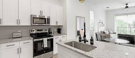 Apartment, 2 Bedrooms | Private kitchen | Full-size fridge, microwave, oven, stovetop