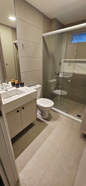 Hair dryer, towels, soap, toilet paper