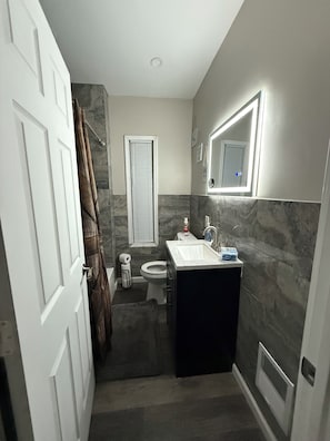 Hair dryer, towels, soap, toilet paper