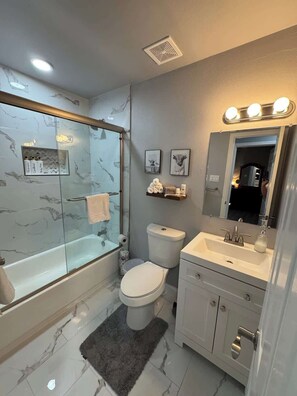 Shower, towels, soap, shampoo