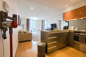 Fridge, microwave, oven, stovetop - Amyra Residences on Rowlands Place - Unit 1205 (Adelaide)