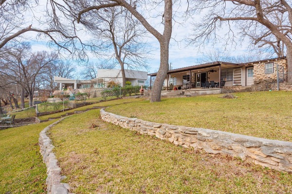 Terraced backyard + multiple patios at Hooked on the River
