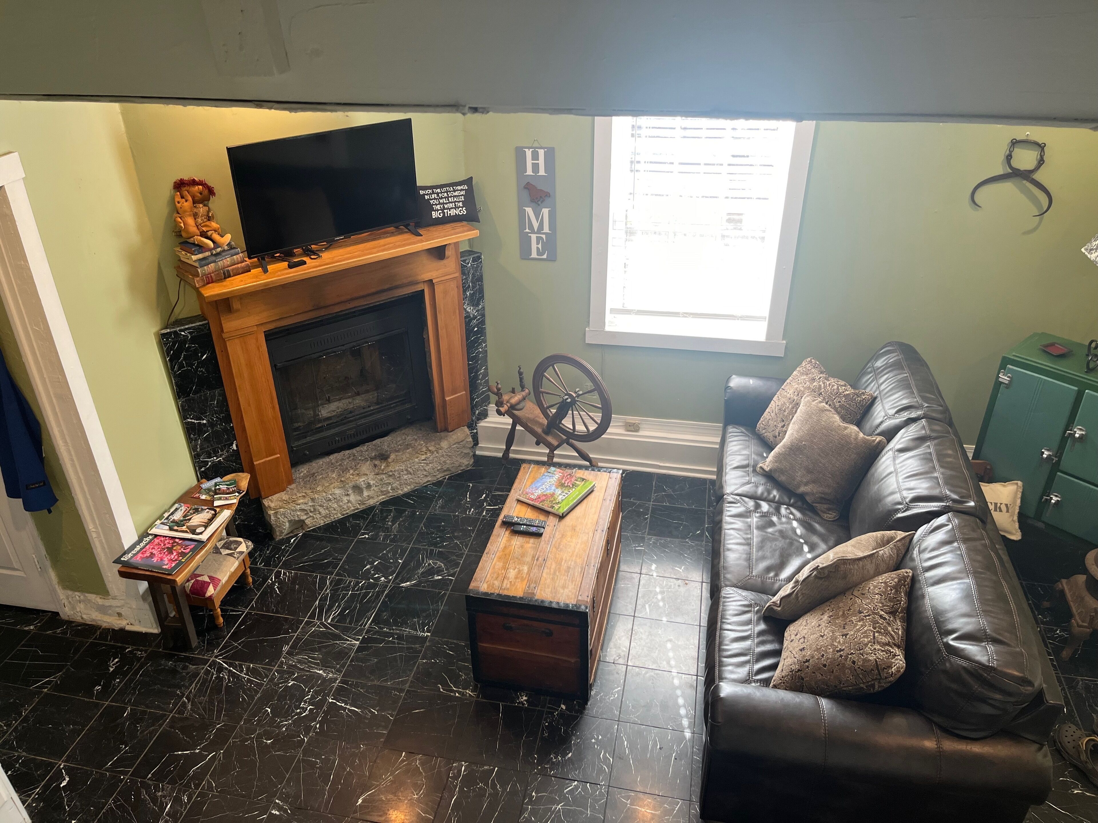 Smart TV, fireplace, books