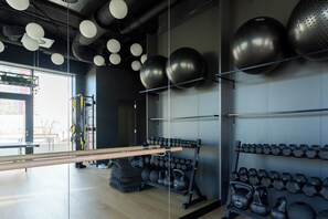 Stay fit and active in our well-equipped gym with kettlebells, dumbbells, and exercise balls.