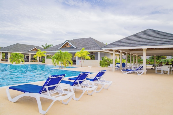 Outdoor pool, open 7:00 AM to 8:00 PM, pool umbrellas, sun loungers