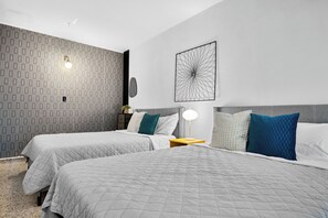 4 bedrooms, desk, iron/ironing board, travel cot