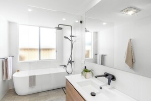 Shower, hair dryer, towels, soap