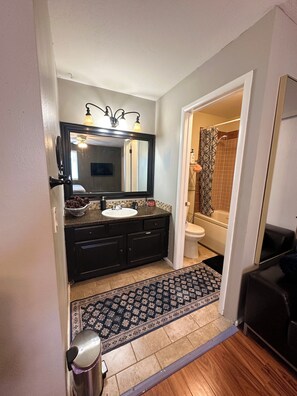 Shower, jetted tub, hair dryer, towels