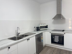 Fridge, microwave, oven, stovetop - Sunflower Homes: Peace and Joy (Para Hills)