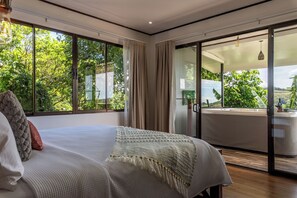 Apartamento Deluxe, vistas al jardín | Caja fuerte, tabla de planchar con plancha, wifi gratis