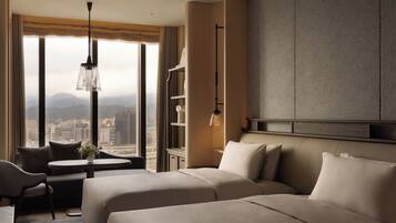 A hotel room with a large bed, a sofa, a small table, and a view of a cityscape through large windows.