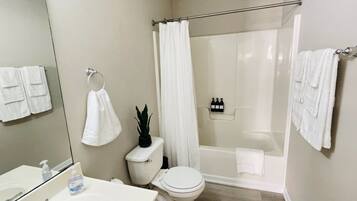 Hair dryer, towels, soap, shampoo