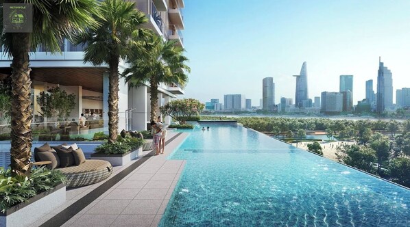 A modern hotel with a rooftop infinity pool overlooking a city skyline. - Metropole Thu Thiem Skyline Apartment (Ho Chi Minh City)