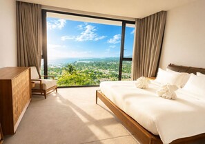 A bedroom with a large window, a bed, a wooden dresser, and a chair. - Anzhu Seamate Villa Samui (Koh Samui)