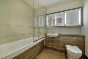 Apartment | Bathroom | Combined shower/tub, deep soaking tub, hair dryer, towels