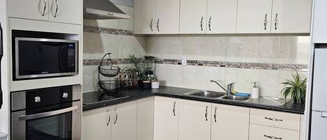 Fridge, microwave, oven, stovetop