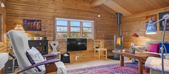 Cozy log cabin with a panoramic view