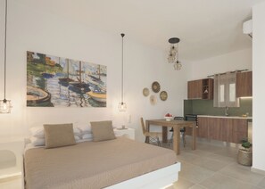 1 habitación, tabla de planchar con plancha, wifi y ropa de cama 
