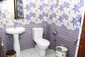 Deluxe Double or Twin Room, Balcony, City View | Bathroom | Shower, bathrobes, slippers, soap
