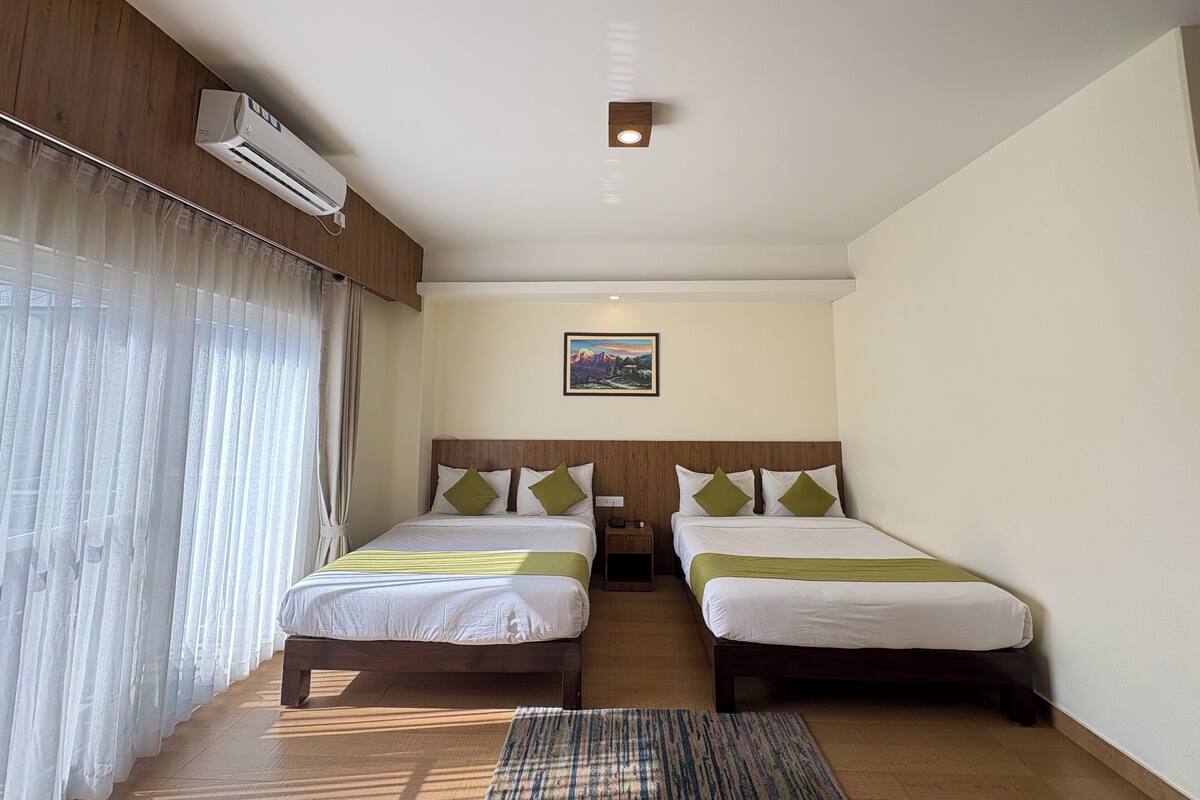 Habitación Deluxe con 2 camas individuales | Escritorio, insonorización, wifi gratis y ropa de cama