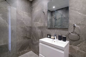 Shower, free toiletries, hair dryer, towels