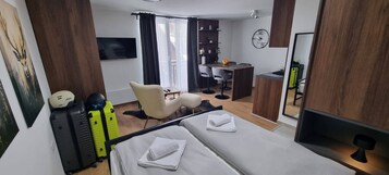 Apartment, 1 Bedroom, City View | Living area | Flat-screen TV