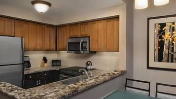 Microwave, coffee/tea maker, cookware/dishes/utensils