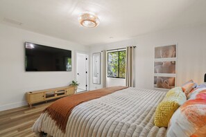4 bedrooms, desk, iron/ironing board, travel cot
