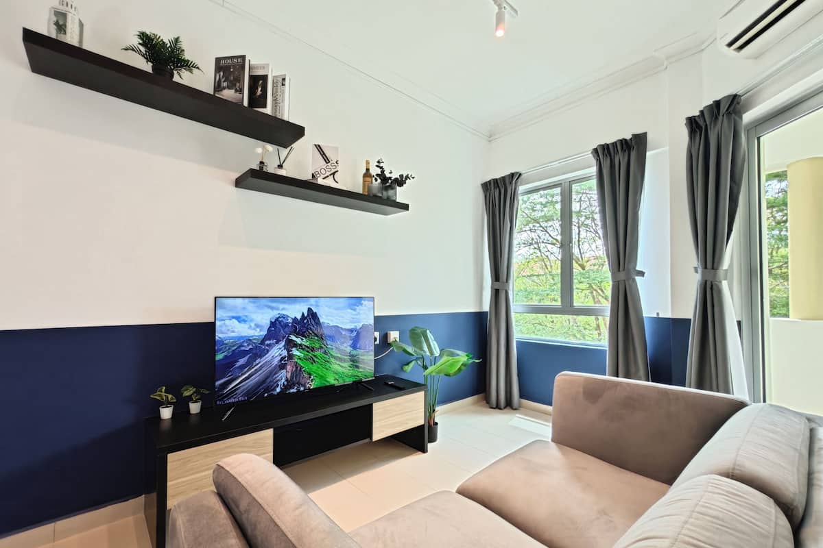 Appartement, 1 slaapkamer | Woonruimte | Een televisie