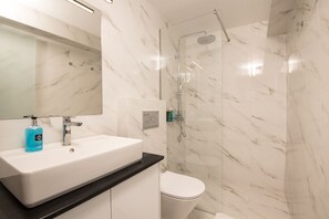 Shower, free toiletries, hair dryer, bathrobes