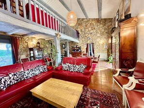 TV, fireplace, books