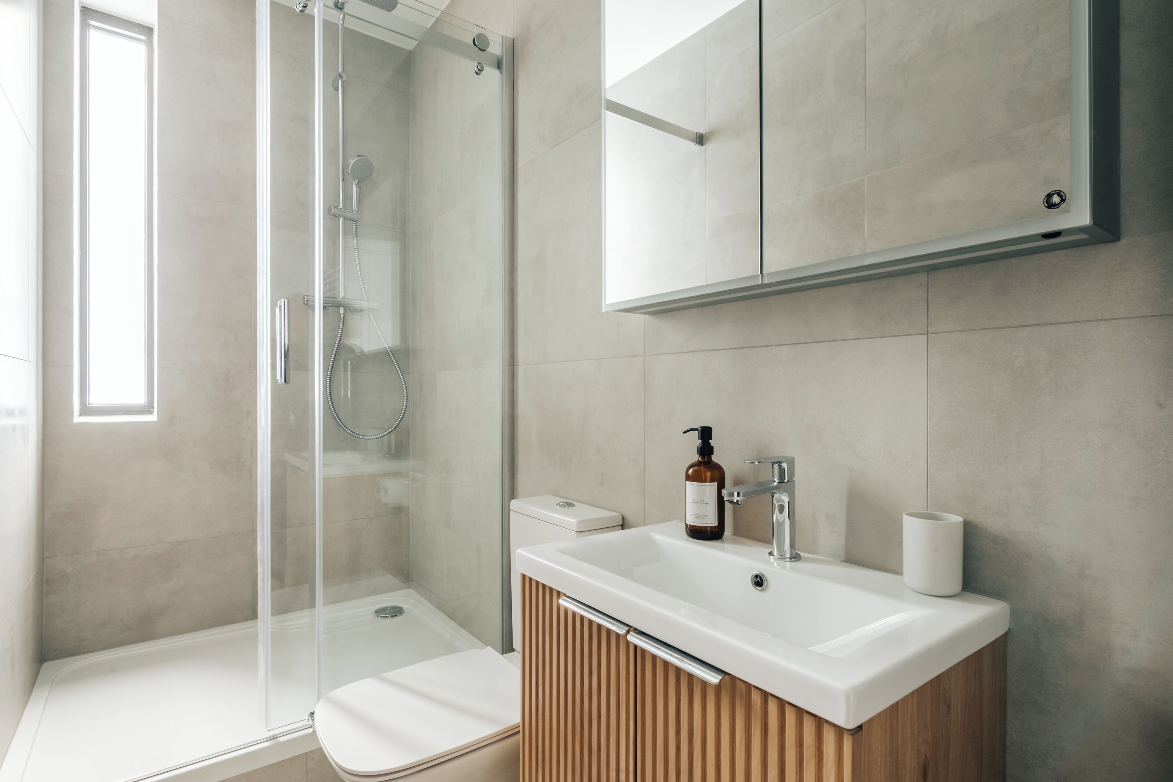 Shower, towels, soap, toilet paper