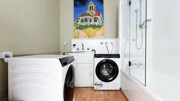 Shower, hair dryer, towels