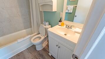 Jetted tub, hair dryer, towels