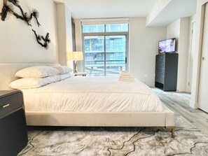 1 bedroom, desk, iron/ironing board, travel cot